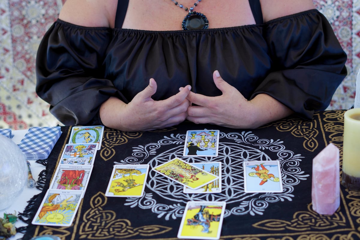 Fortune teller reading tarot cards