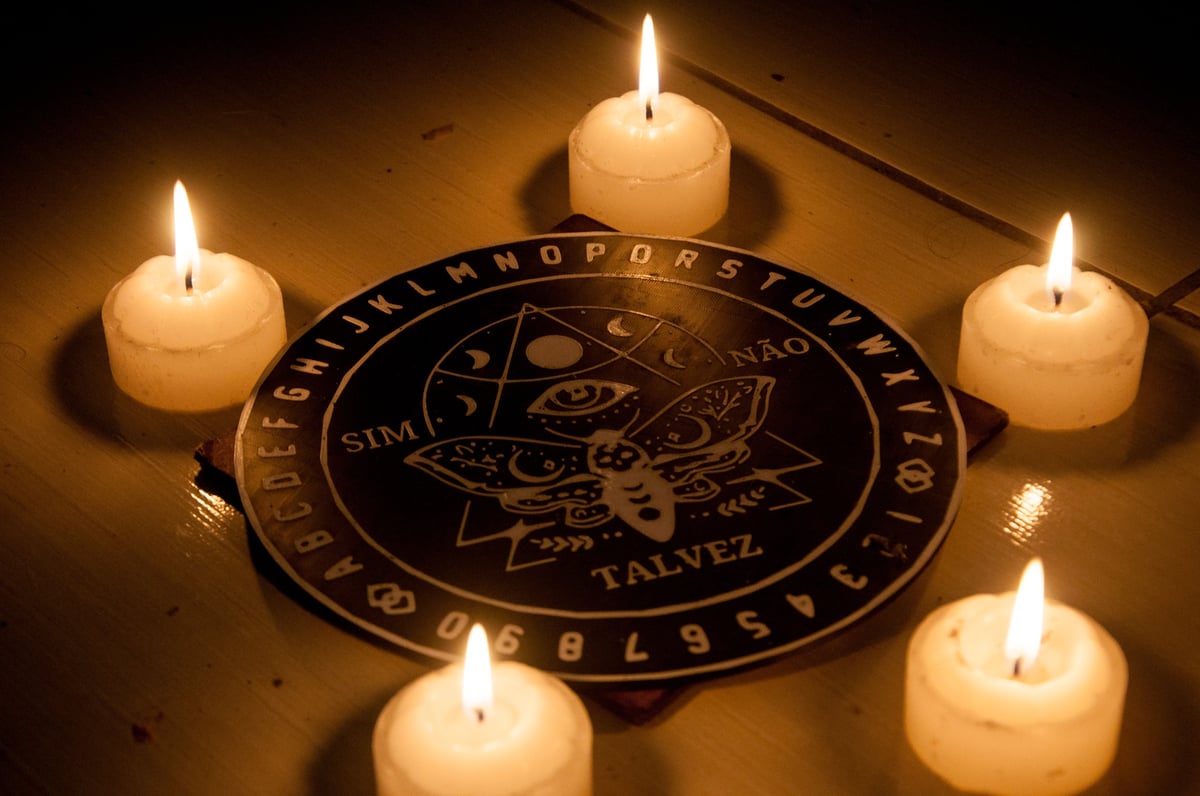 Spiritual healing ritual with pendulum