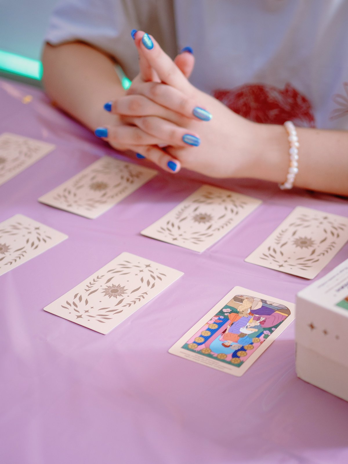 Tarot reading on pink table